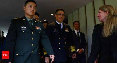 US and Chinese defence chiefs hold rare direct talks in Singapore