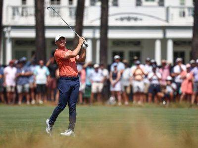 McIlroy fires bogey-free 65 to share US Open lead with Cantlay