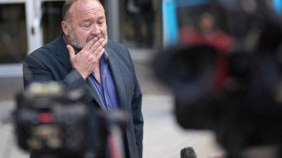 Alex Jones’ personal assets to be sold but company bankruptcy dismissed