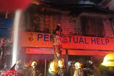 Fire hits religious store in Manila