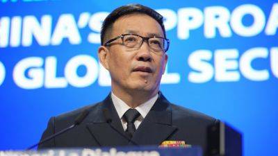 Chinese defense minister accuses US of causing friction with its support for Taiwan and Philippines