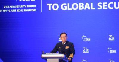 In Singapore, China Warns U.S. While Zelensky Seeks Support