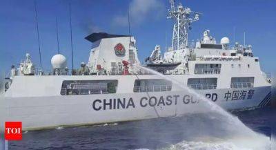 Romeo Brawner-Junior - Thomas Shoal - Philippines demands China return rifles and pay for boat damage after hostilities in disputed sea - timesofindia.indiatimes.com - Philippines - China - city Beijing - city Manila