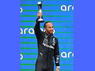 'Good to be back,' says Hamilton after podium return