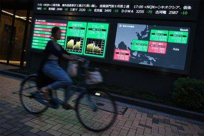 Asian markets rebound on bargain-buying but tech worries linger