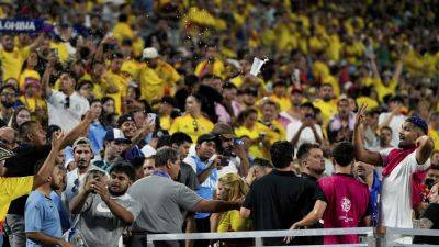 Darwin Núñez, Uruguay teammates enter stands as fans fight after Copa America loss to Colombia - apnews.com - Colombia - Mexico - Uruguay - state North Carolina