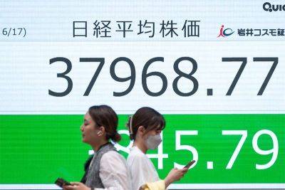 Stocks up on US rate hopes, yen holds gains amid intervention talk