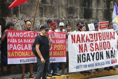 Mayen Jaymalin - Bienvenido Laguesma - Labor groups seek to reverse P35 wage hike - philstar.com - Philippines - city Manila, Philippines