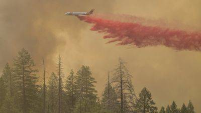 California firefighters make progress as wildfires push devastation and spread smoke across US West - apnews.com - Usa - Canada - Los Angeles - state Oregon - state California - state Indiana - county Park - state Maryland - state Utah - state Colorado