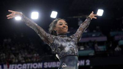 Paris Olympics - Simone Biles - Summer Olympics - International - Team - Simone Biles injury update: What happened at Olympics qualifying - apnews.com - Usa - France - city Tokyo - city Paris, France