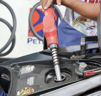 Oil firms lower fuel prices