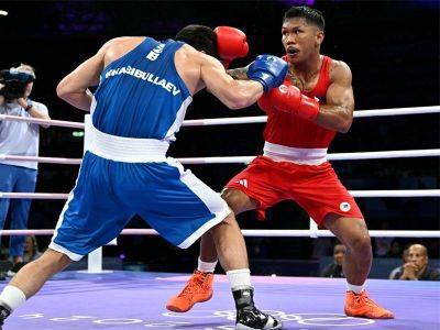 Ralph Edwin Villanueva - Carlo Paalam - Paris Olympics - Eumir Marcial stunned by Uzbek debutant to end Olympic boxing medal bid - philstar.com - Philippines - Cuba - Uzbekistan - city Tokyo - city Manila, Philippines