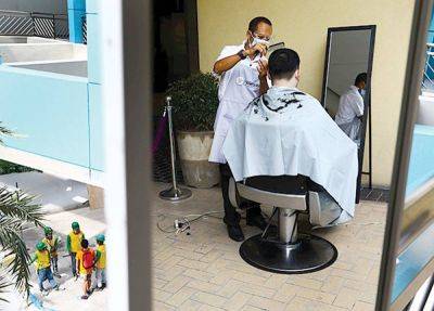 Hair, there and everywhere as DILG asks barbers, salons' help to stop oil spill in Bataan