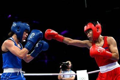 Villegas stuns Algerian 2nd seed to enter Olympic boxing quarters