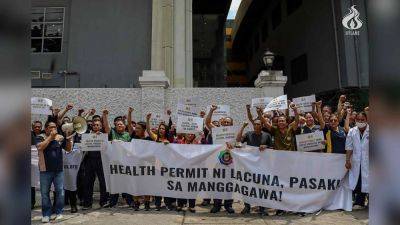 Honey Lacuña - Isko Moreno - UST employees slam Manila LGU over controversial health permit policy - rappler.com - Philippines - Britain - county Hall - city Santo - city Manila, Philippines