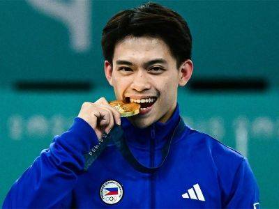 Yulo’s coach says they hit jackpot with 2nd Olympic gold