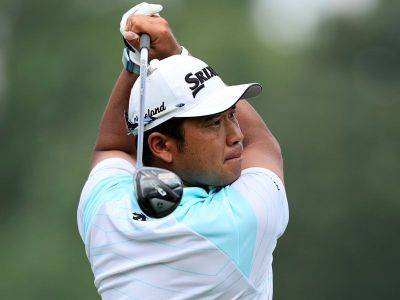 Japan's Matsuyama hits brilliant 65 with stand-in caddie at FedEx St. Jude Championship