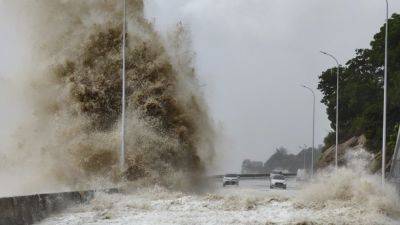 Typhoon Gaemi hits China's coast after leaving 25 dead in Taiwan and the Philippines