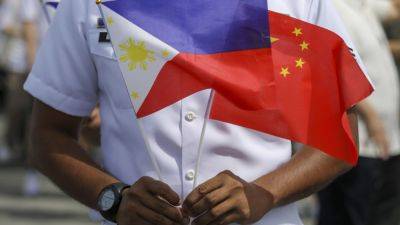 China accuses Philippines of deliberately crashing its ship into Chinese vessel