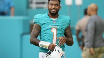 Dolphins' Tagovailoa says McDaniel built him up after Flores tore him down as young NFL quarterback