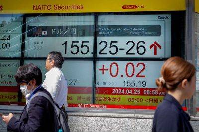 Asia tracks Wall St. rally after US jobs data, Fed minutes