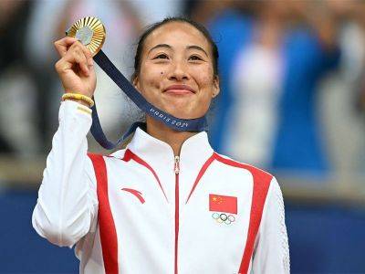 Olympic champion Zheng wants to keep 'winning, winning, winning'