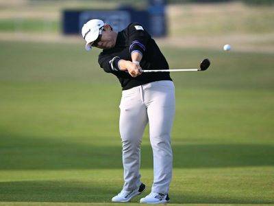 Shin leads British Open from Vu, Korda heading into final round