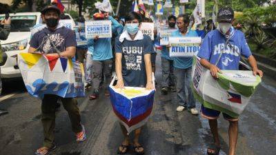 JIM GOMEZ - Sabina Shoal - Teresa Magbanua - Philippines says an 'excessive force' of Chinese ships blocked a food delivery to Filipinos in shoal - apnews.com - Philippines - Usa - China - city Beijing, China - city Manila, Philippines