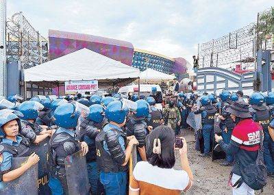 Police surround Quiboloy HQ in bid to serve warrant