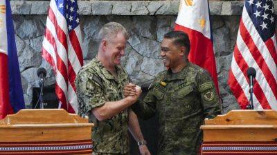 JIM GOMEZ - US forces ready with a 'range of options' to deal with South China Sea aggression, US admiral says - apnews.com - Philippines - Usa - China - Washington - city Beijing - city Manila