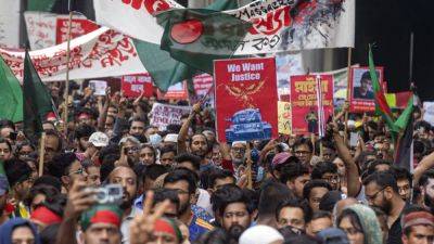 Euronews - Two dead and dozens injured as thousands protest against prime minister in Bangladesh - euronews.com - Bangladesh