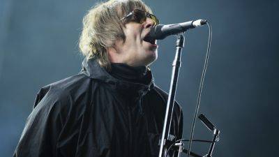 Oasis reunion tickets: Fans face lengthy online queues - apnews.com - Reunion - city London - city Manchester