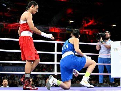 Controversial boxer moves closer to gold