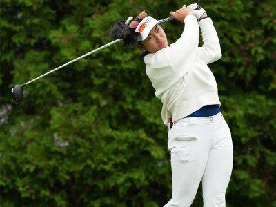 Pagdanganan rallies late to secure joint 13th in Olympic golf opener