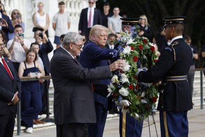 Harris says Trump 'disrespected sacred ground' at US military cemetery