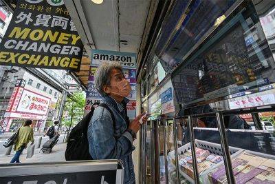 Most markets up ahead of Fed but Tokyo hit by strong yen