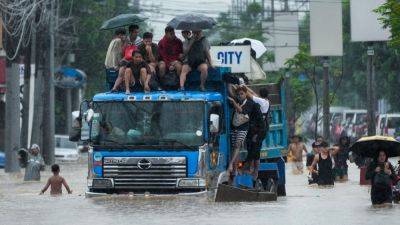 Storm sets off floods and landslides in Philippines, leaving at least 14 dead - ctvnews.ca - Philippines - China - province Samar - province Rizal - city Manila - city Antipolo - city Cebu