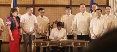 Marcos signs Magna Carta of Filipino Seafarers