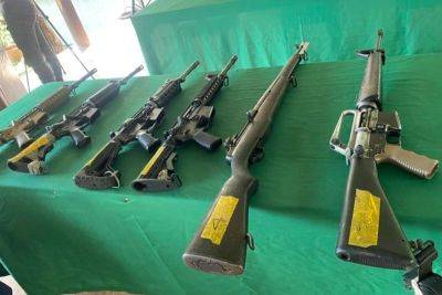 Cotabato City barangay execs surrender assault rifles to Army