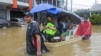 Fierce storm blows out of northern Philippines after leaving 14 dead in landslides and floods - ctvnews.ca - Philippines - China - county Bay - city Manila, county Bay